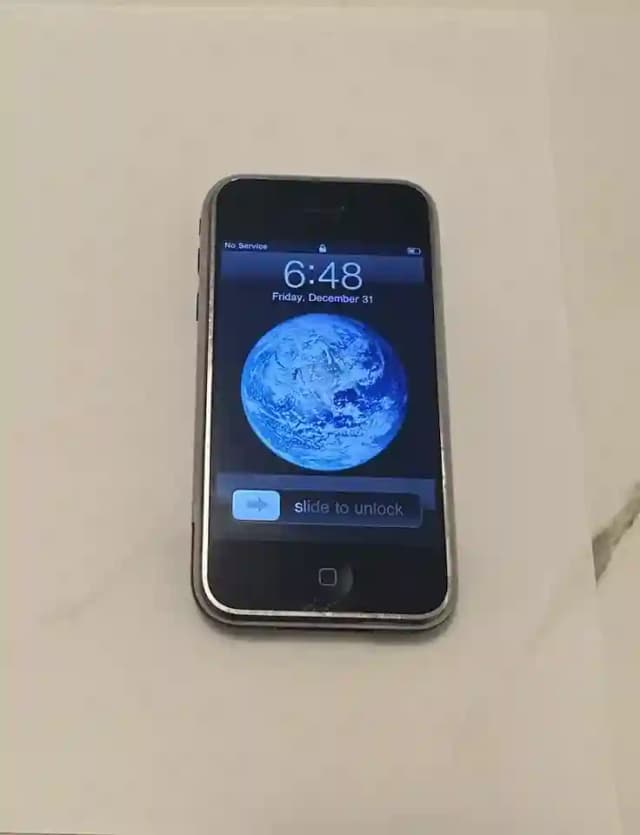 New ListingApple iPhone 1st Generation - 8GB - Black (AT&T) A1203 (GSM) C60